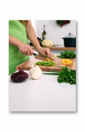 Close up of  woman's hands cooking in the kitchen. Housewife slicing ​​white bread. Vegetarian and healthily cooking concept