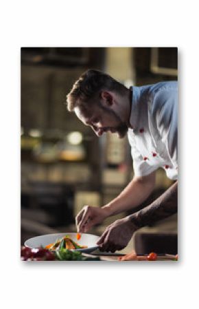 Male cook serve delicious steak on the cutting board at street cafe