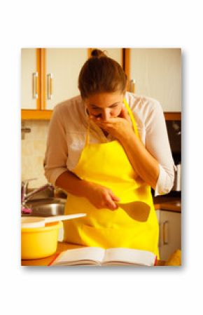 Housewife planning and preparing meal