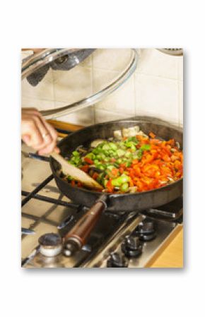 Chopped vegetables on frying pan