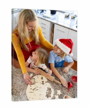 Family making Christmas cookies at home