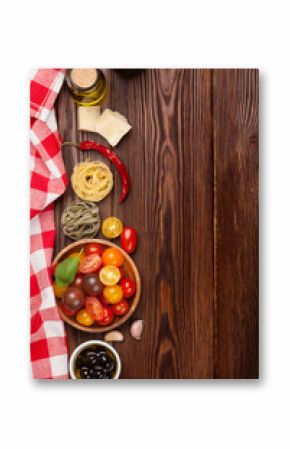Italian food cooking ingredients. Pasta, vegetables, spices