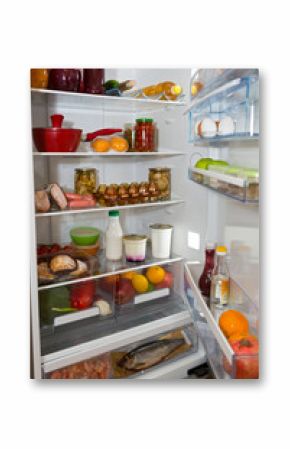 Domestic refrigerator full of a variety of foods