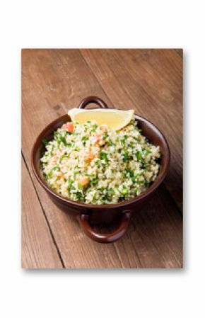 Turkish traditional meal - Taboulé Salad on a wooden table made