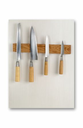 light knives on magnetic holder to the wall in the kitchen