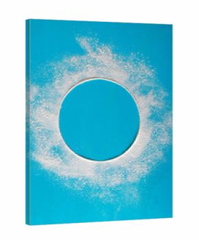 Round trail of flour. Frame made of flour for text. On a blue background.Top view. Flat lay.
