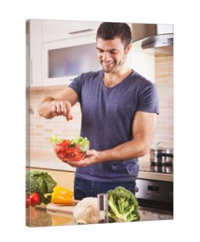Man preparing salad at home
