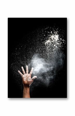 Hand and flour on black background