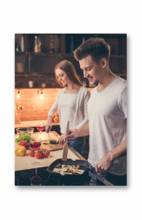 Beautiful couple cooking