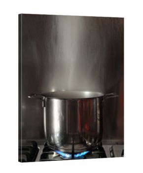 Steel pot boiling on fire
