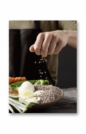 man preparing a vegetarian lentil stew