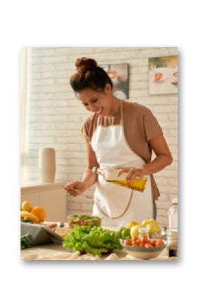 Adding oil in salad