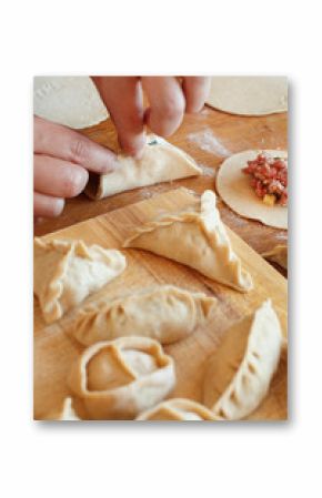 Making dumplings manti