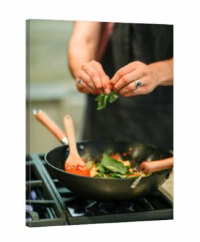 Chef cooking up a vegan pasta dish
