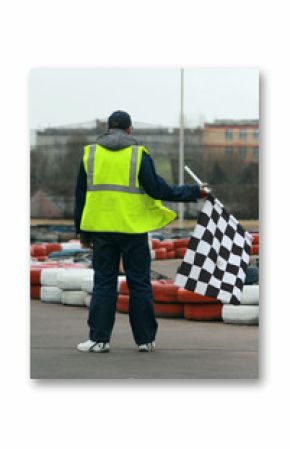 Worker with flag on go-cart racing