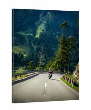 Motorcyclist on mountainous road