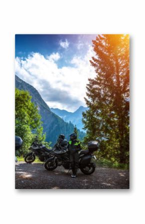 Biker resting in the mountains