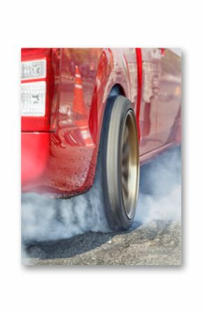 Drag racing car burns  tire in preparation for the race