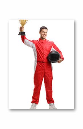 Racer standing and holding a helmet and a gold trophy cup