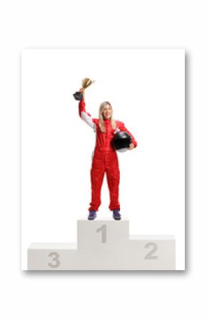 Female racer on a winner's pedestal with gold trophy cup