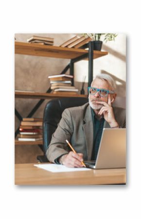 An old man in thought at the office table. An experienced lawyer draws up a contract. Provincial broker consultation.