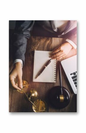 Business and lawyers discussing contract papers with brass scale on desk in office. Law, legal services, advice, justice and law concept picture with film grain effect