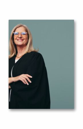 Happy female judge smiling at the camera in a studio