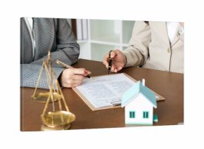 Professional Legal Consultation with Lawyers Reviewing Contract Documents and Scales of Justice on Desk