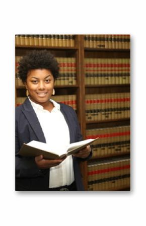 Portrait of an attractive African American female lawyer in law library