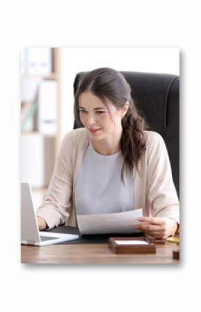 Young female notary working in office