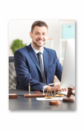 Young male notary working in office