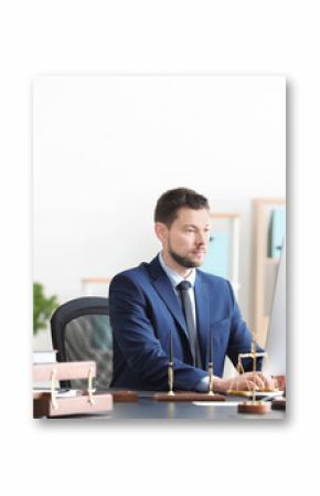 Young male notary working in office