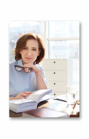 Female lawyer working at table in office