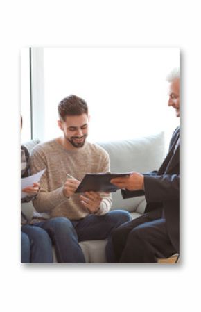 Couple meeting with notary public in office