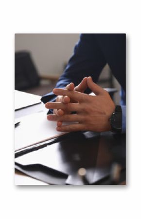 Male lawyer at table in office, closeup