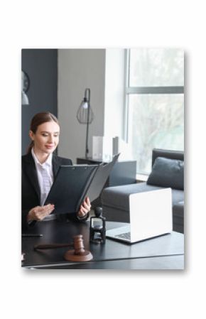 Female lawyer sitting at workplace in office