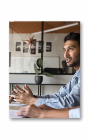 Company executive analyst making report at meeting, business team people listen to project manager. Diverse office people talking, planning financial strategy, discussing marketing enterprise solution