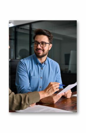 Smiling female attorney lawyer, financial advisor or bank manager consulting client investor reading document at business meeting reviewing legal paper file planning taxes working in office.