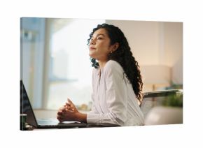 Business woman, thinking and laptop in office for legal research, case preparation or drafting will. Attorney, female person and advocate at law firm for court review, lawsuit idea or legislation