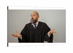 Hispanic bearded man in judge robe posing with unsure expression on isolated white background.