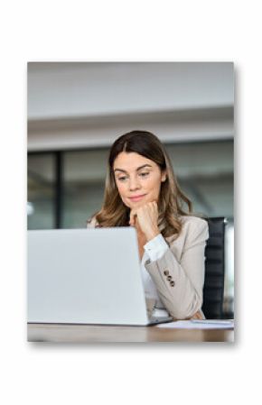 Busy professional business woman company leader of middle age looking at computer working on corporate data, mature female executive financial manager in her 40s using laptop sitting at office desk.