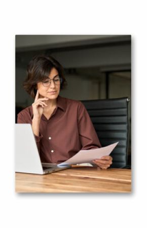 Businesswoman ceo executive or legal expert using laptop computer at work. Busy serious young business woman manager working in office checking law document account invoice thinking in office