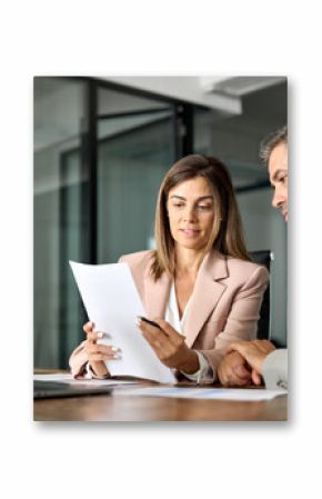 Business woman lawyer manager holding legal documents consulting mature older client at office meeting, two professional executives experts discussing financial accounting papers working together.