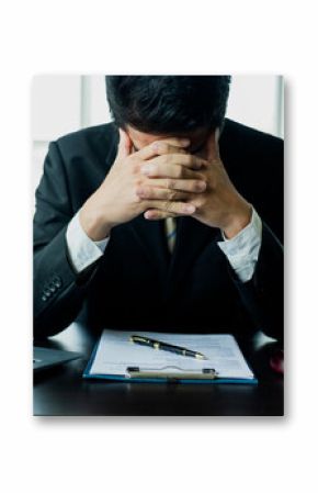 A lawyer or businessman is stressed about losing a lawsuit and going bankrupt.