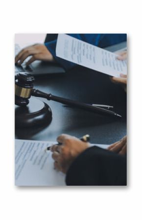 Business and lawyers discussing contract papers with brass scale on desk in office. Law, legal services, advice, justice and law concept picture with film grain effect