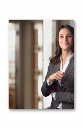 Candid portrait of a joyful cheerful happy employee staff member leader at the office workspace