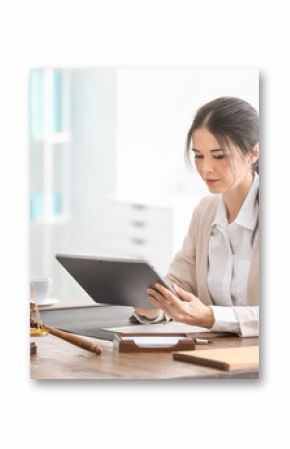 Young female notary working in office