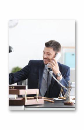 Young male notary working in office