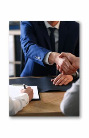 Male lawyer working with clients in office, closeup