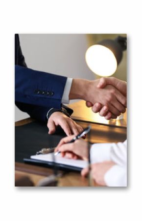 Male lawyer working with clients in office, closeup